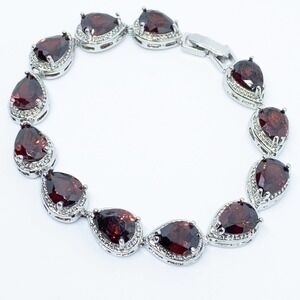 Ruby Red Pear Cut White Gold Tennis Bracelet
